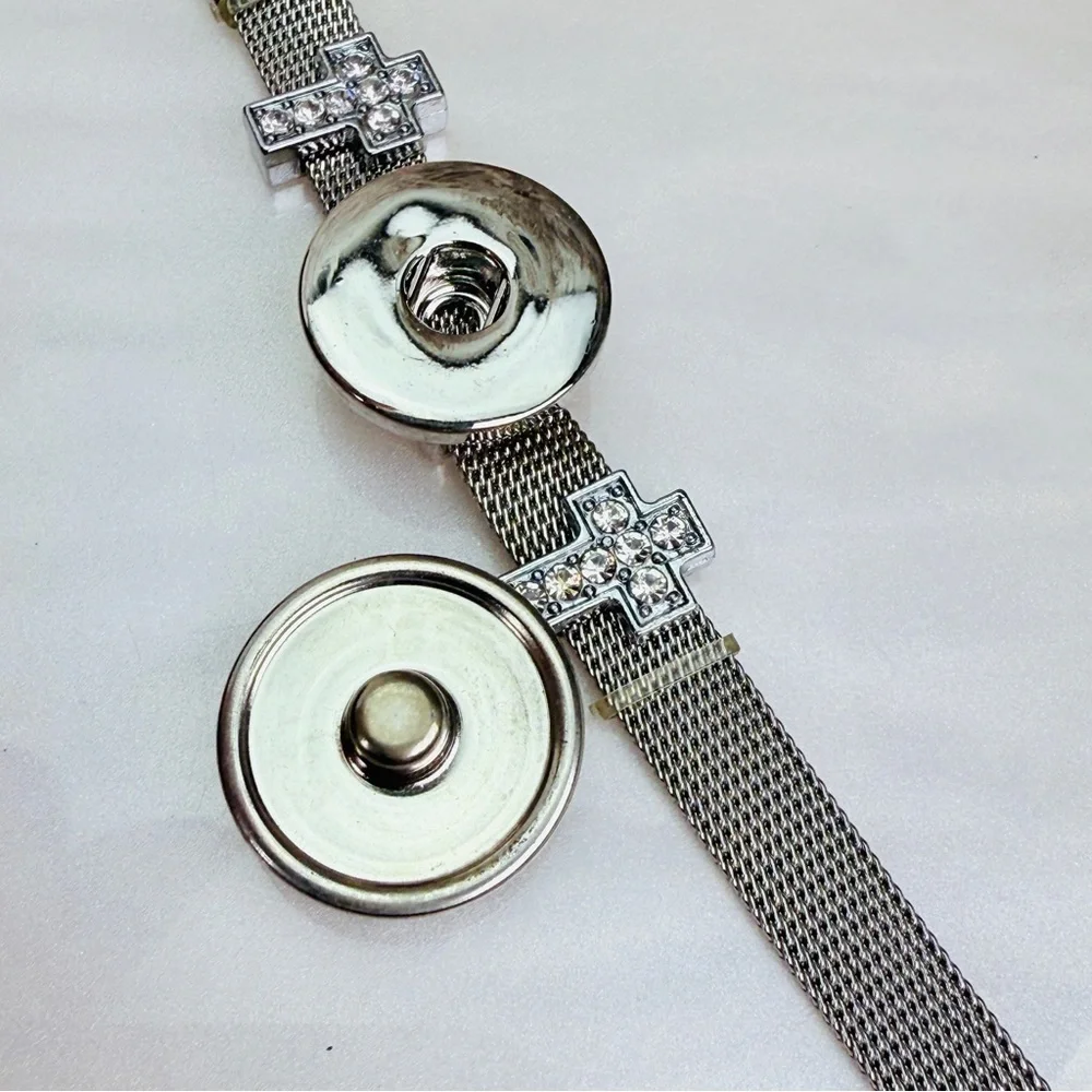Silvertone Mesh Snap Bracelet with Blue Cross Design